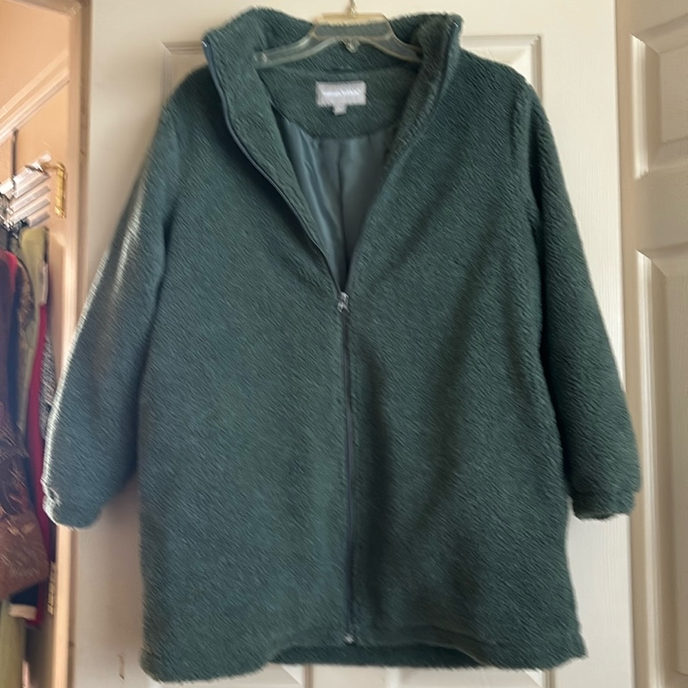 Green winter coat.